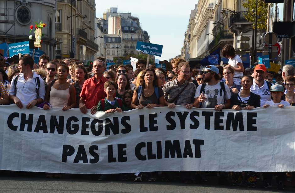 Climate change protesters march in Paris streets